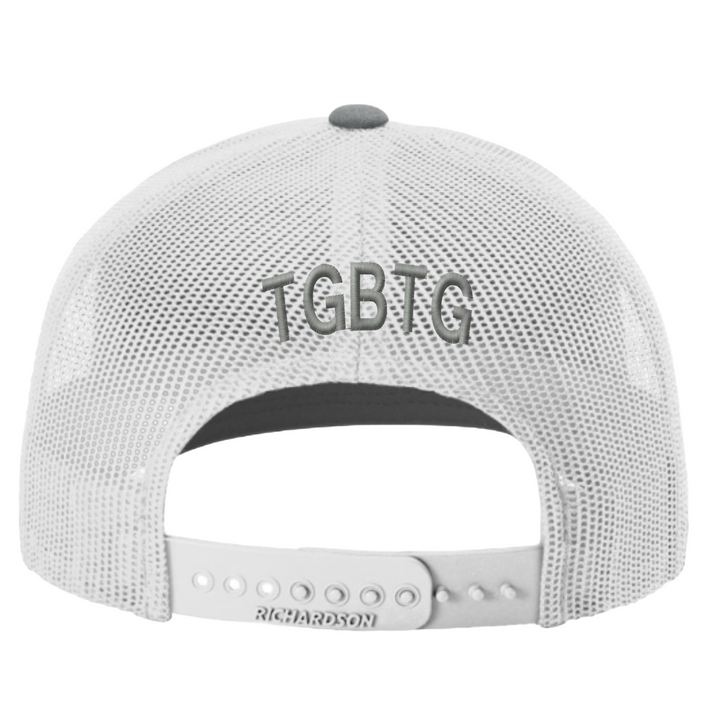 White mesh cap with a grey 'TGBTG' branding above the snapback closure. 